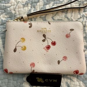 SOLD****Coach Cherry wristlet in chalk